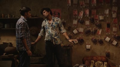 Randeep Hooda, right, stars as a criminal who makes his fortune selling blood illegally. Courtesy of Laal Rang