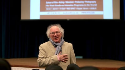 Allan Nicholls, artistic director of the New York Film Academy, talking yesterday to pupils from Abu Dhabi Vocational Education and Training Institute where he urged them to consider careers in filmmaking. Ravindranath K / The National