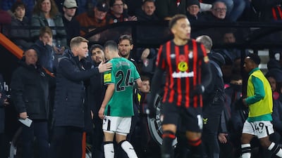 Newcastle United's Miguel Almiron with manager Eddie Howe after being substituted. Action Images