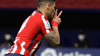 Suarez celebrates his winning goal. EPA