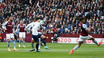 Son Heung-min scores Tottenham's first goal . PA