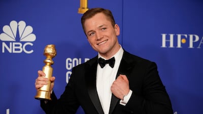 Taron Egerton poses with his award for Best Performance by an Actor in a Motion Picture - Musical or Comedy for his role in 'Rocketman' during the 77th annual Golden Globe Awards on January 5, 2020, at The Beverly Hilton hotel in Beverly Hills, California. Reuters