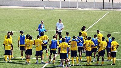 Srecko Katanec, in white shirt, directs training as the UAE team prepare for tonight’s Gulf Cup semi-final against Saudi Arabia.