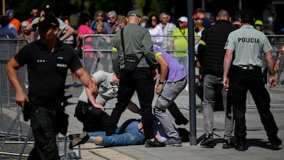 A person is detained after Slovakian Prime Minister Robert Fico was shot at close range in an assassination attempt in Handlova last week. Reuters