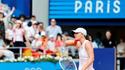 Iga Swiatek of Poland reacts after losing her semi-final against Qinwen Zheng of China. EPA