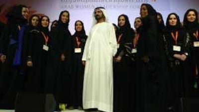 Sheikh Mohammed bin Rashid, Vice President of the UAE and Ruler of Dubai, at the Arab Women Leadership Forum yesterday with, centre left, Mona al Marri, the chief executive of Brand Dubai.