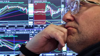 A trader on the floor of the New York Stock Exchange. The market received a boost this week on favourable US economic data. Reuters