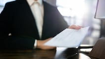 A bonus worth almost half an employee’s annual salary could become the benchmark for what companies can pay while remaining within acceptable limits. iStockphoto