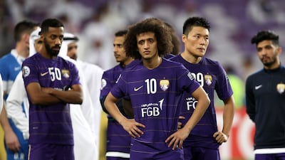 Omar Abdulrahman and his Al Ain teammates following defeat to Jeonbuk Hyundai Motors in the 2016 Asian Champions League final. AFP
