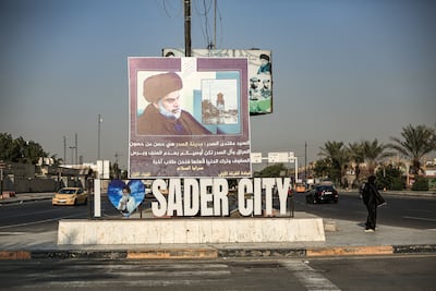A poster depicting Moqtada Al Sadr calls for a boycott of Iraqi parliamentary elections in November 2025. Getty Images