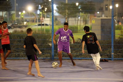 Children play football at the Al Mubarakah Foundation. Chris Whiteoak / The National