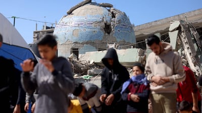 Displaced Palestinians pray on the first Friday prayers of the holy month of Ramadan in Gaza. EPA
