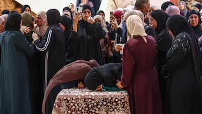 Palestinians mourn Khalil Shehadeh and Omar Al Naasan, two teenagers killed by Israeli troops in a village in the occupied West Bank. AFP