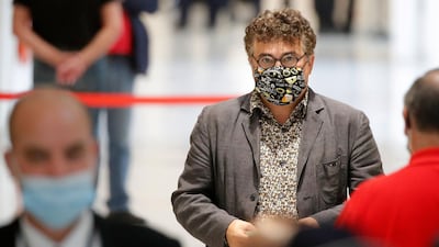 French writer, activist and emergency doctor Patrick Pelloux is seen on the opening day of the trial. Reuters