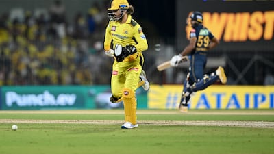 Chennai Super Kings' wicketkeeper MS Dhoni fields the ball. AFP