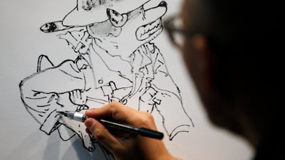 He was best known for recreating complex scenes from memory and holds the Guinness World Record for “longest drawing by an individual”. AFP