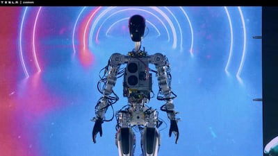 Tesla's AI Day 2022 livestream introduced the humanoid robot Optimus as it walks on stage in Palo Alto, California. All photos: AFP
