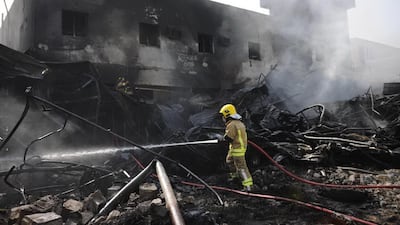 Civil Defence tackle a fire which broke out in Mussaffah on Tuesday morning. Courtesy Security Media