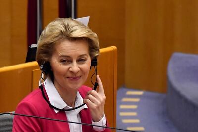 Ursula von der Leyen, president of the European Commission, adjusts her headphones in the hemicycle of the European Parliament in Brussels Bloomberg