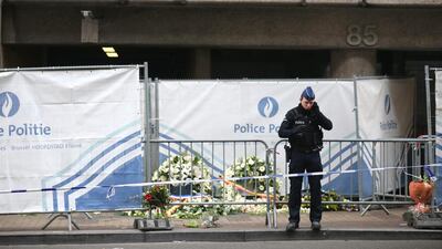 A police officer stands guard outside the closed Maelbeek metro station on March 24, 2016 in Brussels. Christopher Furlong/Getty Images