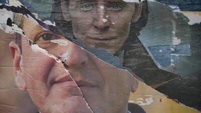 Vandalised political posters of Argentina's Economy Minister and presidential candidate for Union por la Patria party, Sergio Massa, Buenos Aires. AFP