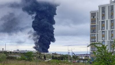 Smoke rises over a fuel tank following an alleged drone attack in Sevastopol, Crimea. Reuters