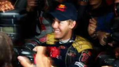 Toro Rosso's German driver Sebastien Vettel celebrates his maiden Formula One win at his team's home grand prix in Monza, Italy.