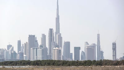 A view of Dubai’s skyscrapers. The use of Al Etihad Credit Bureau’s reports by real estate firms will help reduce rental defaults and disputes, analysts say. Antonie Robertson / The National.