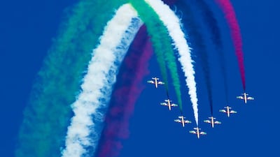 UAE Air Force aerobatic display team, Al Fursan, performs during the Abu Dhabi Air Expo at Al Bateen Executive Airport in Abu Dhabi.