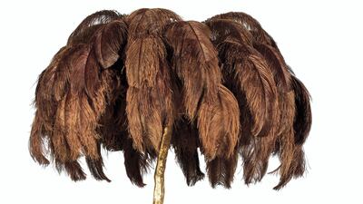 Lot 64: chocolate resin and ostrich feather floor lamp. Photo: Dreweatts