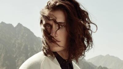 A world apart: Tank top, Dh3,300; cardigan, Dh18,600, both from Hermès. Shirt, Dh340, Deus Ex Machina at Capital D Studio. Rings, price on request, Versace