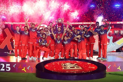 Rajat Patidar of Royal Challengers Bengaluru lifts the 2025 IPL trophy after beating Punjab Kings at Narendra Modi Stadium on June 3, in Ahmedabad, India. Getty Images