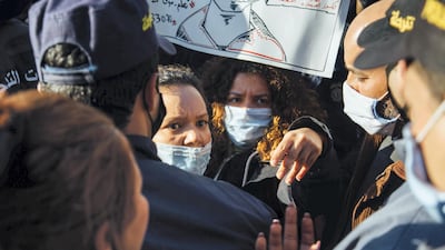 Protesters and police square off on Avenue Habib Bourguiba on Tuesday. Erin Clare Brown / The National