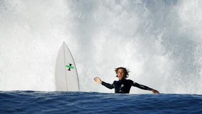 A surfer wipes out in Cardiff, California. Mike Blake / Reuters