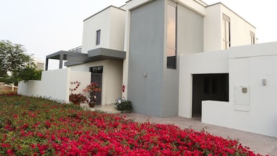 The exterior of the villa, which has floor-to-ceiling windows in the living room