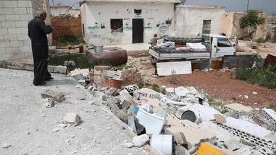 Syrians prepare to leave their houses in the village of Rabaa Jour, Idlib. AFP