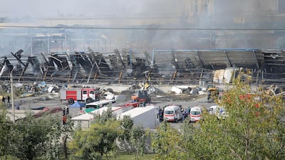 Smoke rises from the scene. AFP