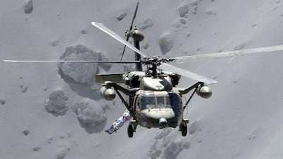 Japan’s meteorological agency raised the alert level for Mount Ontake to 3 on a scale of 1 to 5. It warned people to stay away from the mountain, saying ash and other debris could fall up to four kilometres away. Kyodo News / AP Photo