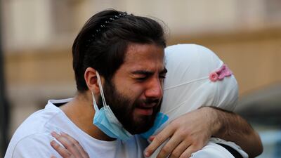Relatives of Ibrahim Harb, 35, who was critically injured in the massive explosion at Beirut's port last year and died on Monday nearly 14 months after the blast, mourn during his funeral procession in Beirut, Lebanon. Photo: AP