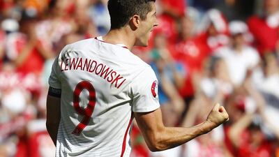 Poland's Robert Lewandowski celebrates scoring during the penalty shootout against Switzerland in their Euro 2016 last 16 match on Saturday. Kai Pfaffenbach / Reuters / June 25, 2016
