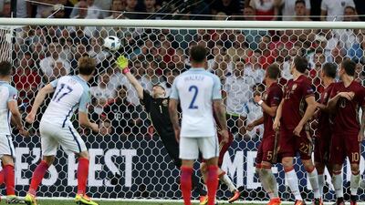 Eric Dier (C) of England scores the opening goal by freekick during the Uefa Euro 2016 group B preliminary round match between England and Russia at Stade Velodrome in Marseille, France, 11 June 2016. Tolga Bozoglu / EPA