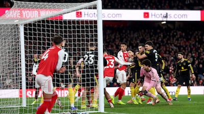 Mikel Merino scrambles home Arsenal's second goal. Getty Images
