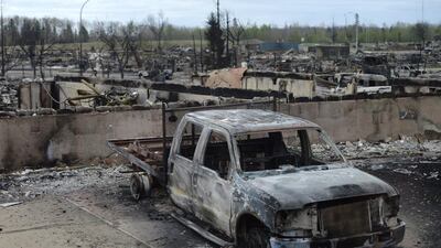 Canadian society is likely to have been made stronger and more cohesive by the Fort McMurray fires. (Jonathan Hayward/The Canadian Press via AP)