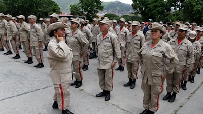 Venezuelan president Nicolas Maduro ordered military exercises in response to US president Donald Trump's warning of possible military action to resolve the country's crisis. In this picture, militia members receive instructions in Fort Tiuna, Caracas on August 25, 2017. Ricardo Mazalan / AP