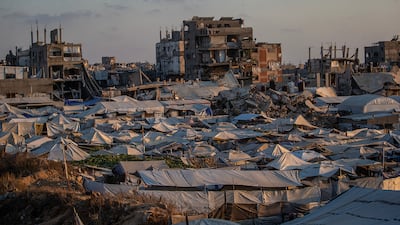 Makeshift shelters of displaced Palestinian families between the remains of their bombed houses in Gaza city. EPA