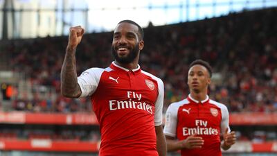 Alexandre Lacazette celebrates his goal during Arsenal's defeat to Sevilla in the Emirates Cup. John Walton / PA Wire