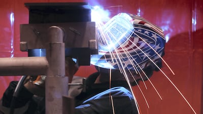 Alireza Badri of Iran competes in the welding category at WorldSkills. Young people from 77 countries are competing in in 51 skills competitions. Chris Whiteoak / The National