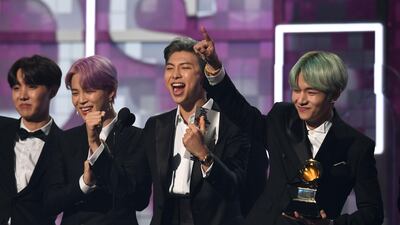 South Korean band BTS presents the award for Best R&B Album during the 61st Annual Grammy Awards in Los Angeles. AFP