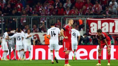 Bastian Schweinsteiger, left, Thomas Muller and Bayern Munich looked likely to have a chance to repeat as champions last season until Real Madrid shocked them at Munich. Madrid went on to defeat Atletico Madrid to take the Uefa Champions League title. Martin Rose / Getty Images