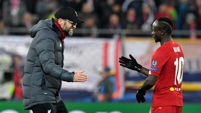 Liverpool's manager Jurgen Klopp celebrates with Sadio Mane at the end of the Champions League match against Salzburg. AP